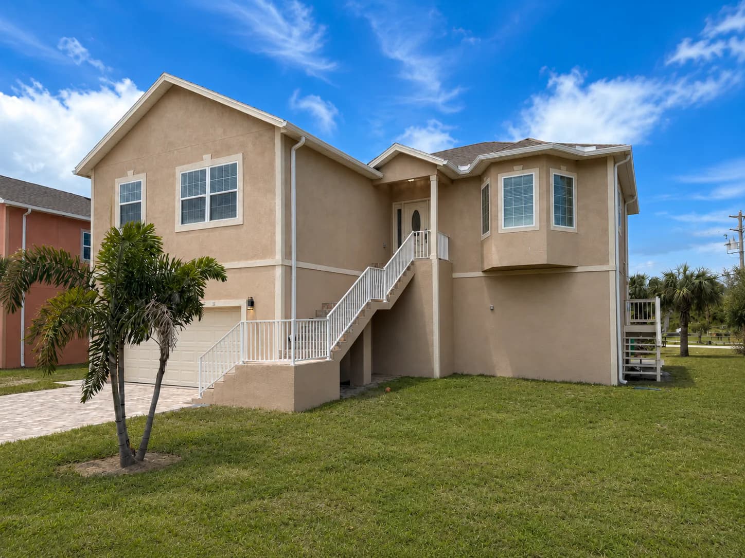 Angled front exterior of 1083 S Pointe Alexis Drive in Tarpon Springs